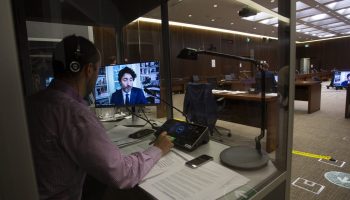 Prime Minister Justin Trudeau appears remotely before the House of Commons Standing Committee on Finance  as they complete an investigation into the ongoing WE Charity scandal on July 30, 2020. Interpretation booth. Interpreters. The Hill Times photograph by Andrew Meade