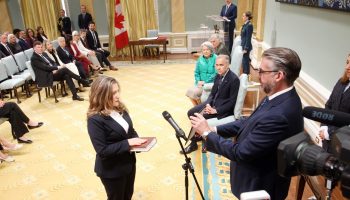 John Hannaford swears in Chrystia Freeland. The Hill Times photograph by Sam Garcia